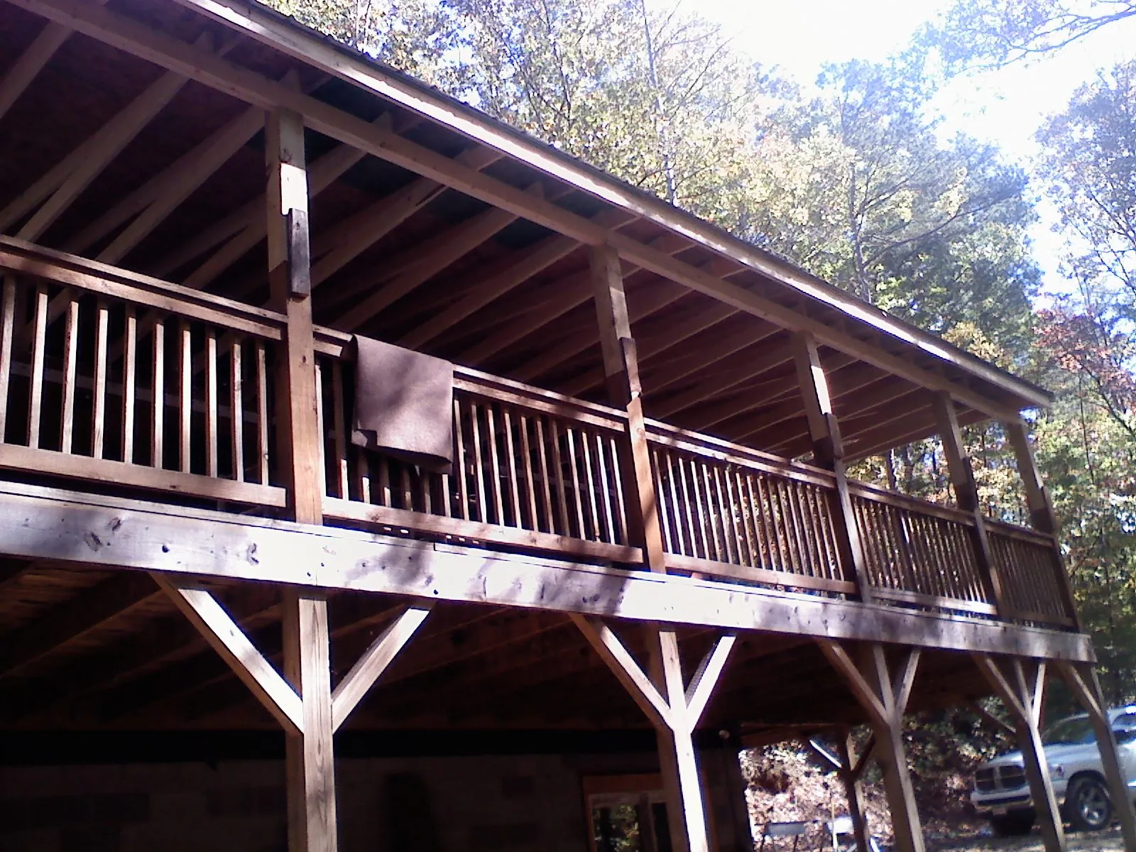 Timber framing under a new elevated porch and deck — Roof Leak Repair in Cameron by Roofing Brothers
